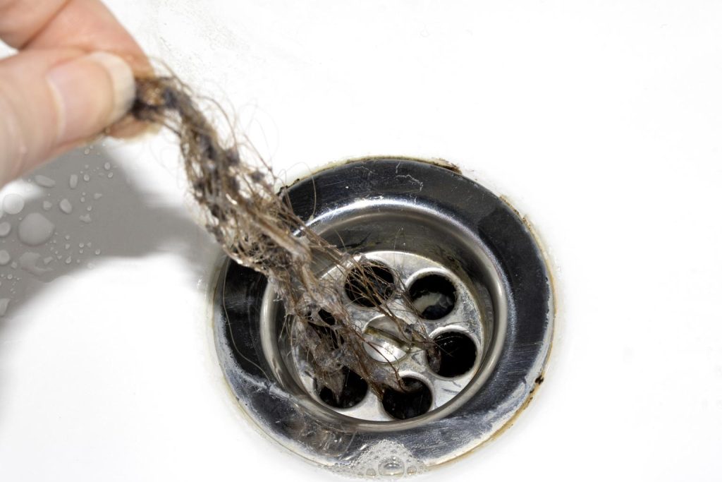 removing clogged hair