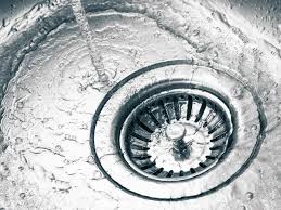 pour hot water in clogged drain