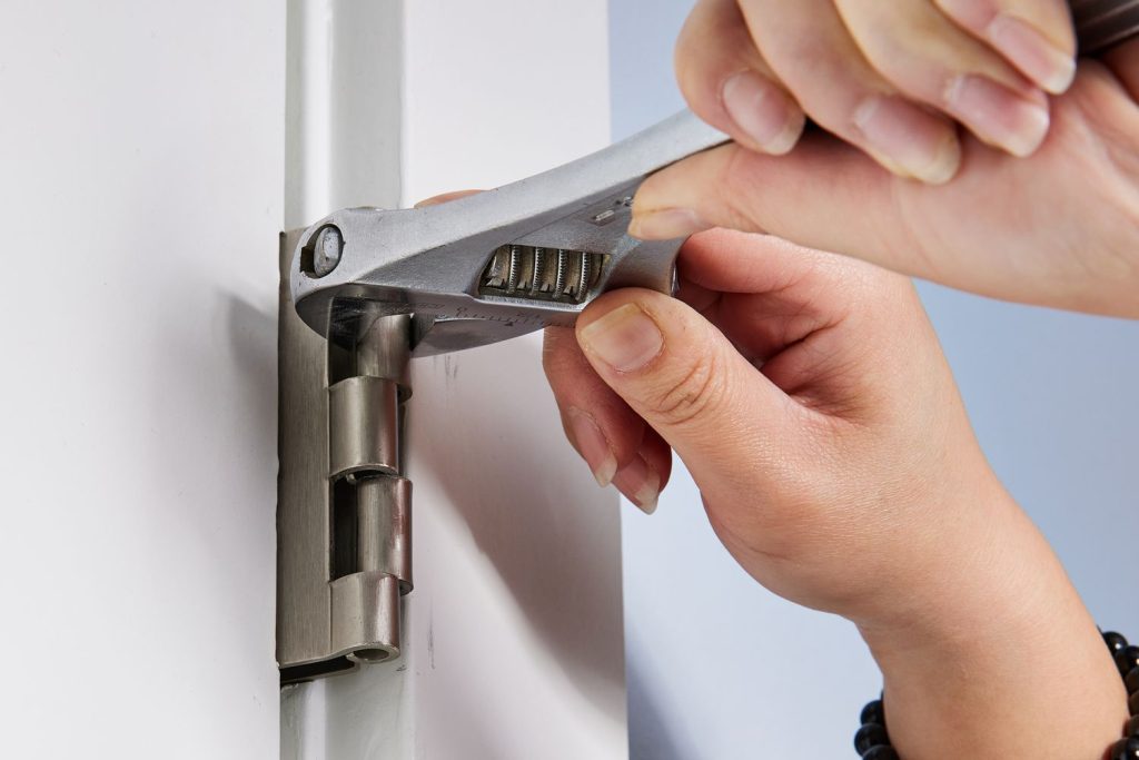 adjust door hinge